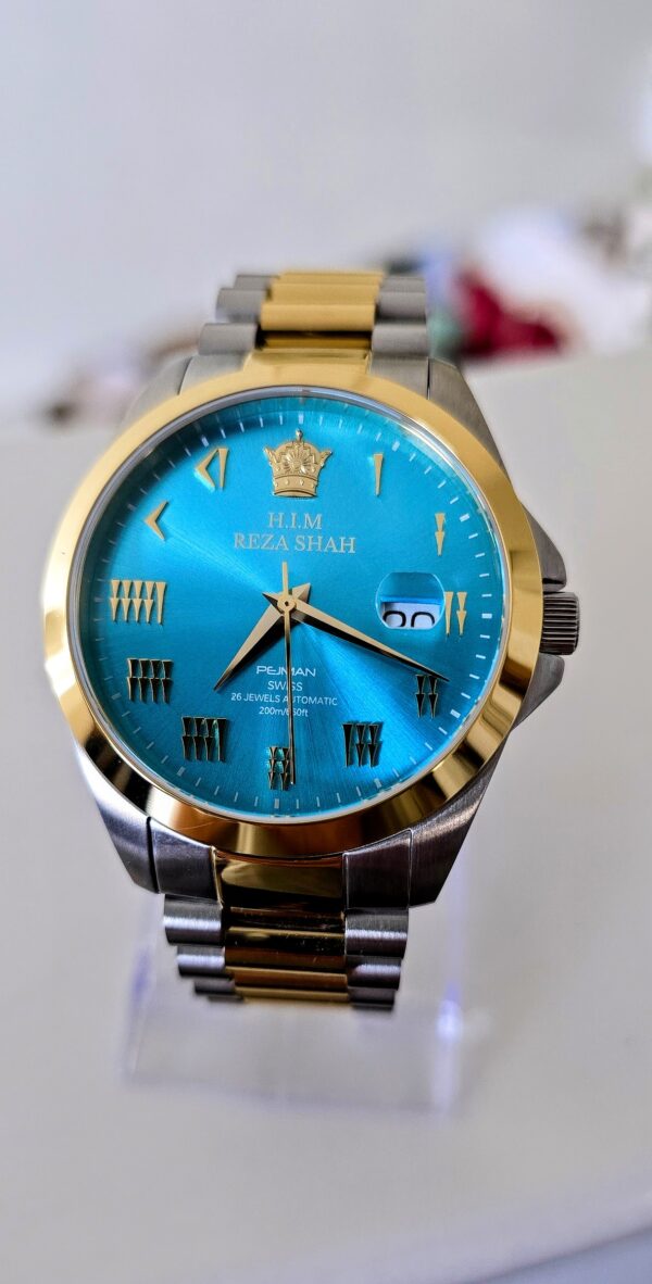 A blue and gold watch with roman numerals on it.