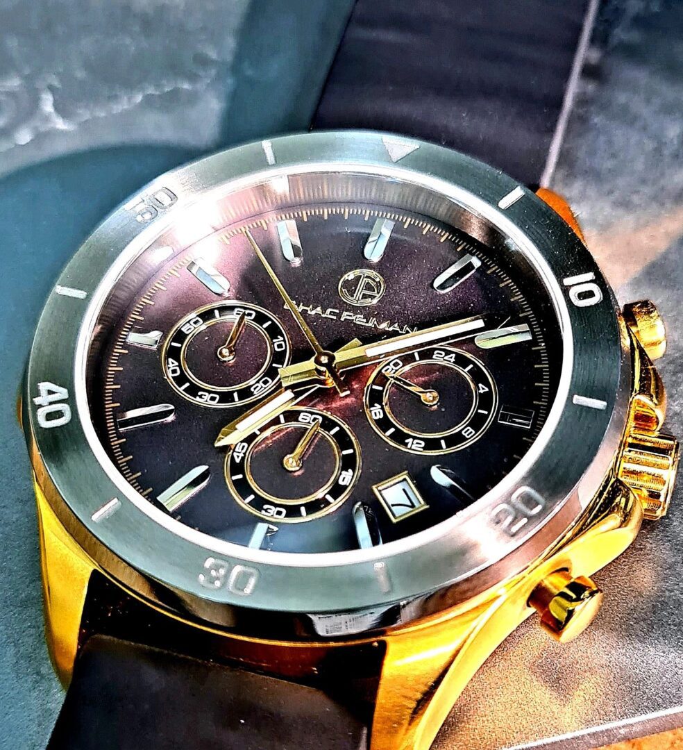 A close up of a watch on the wrist