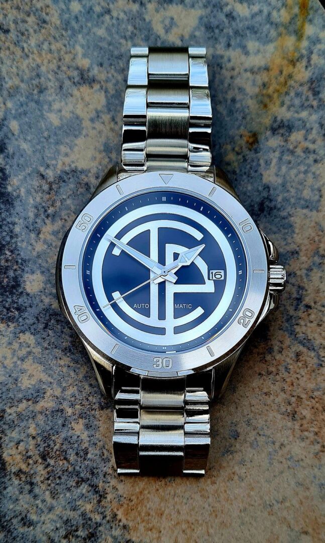 A watch with the letters fc on it