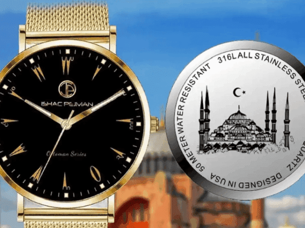 A watch and some coins on top of a wall.