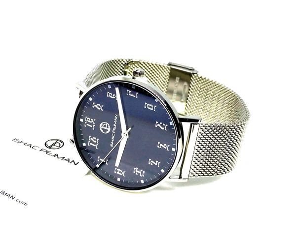 A watch is shown with the tag on it.