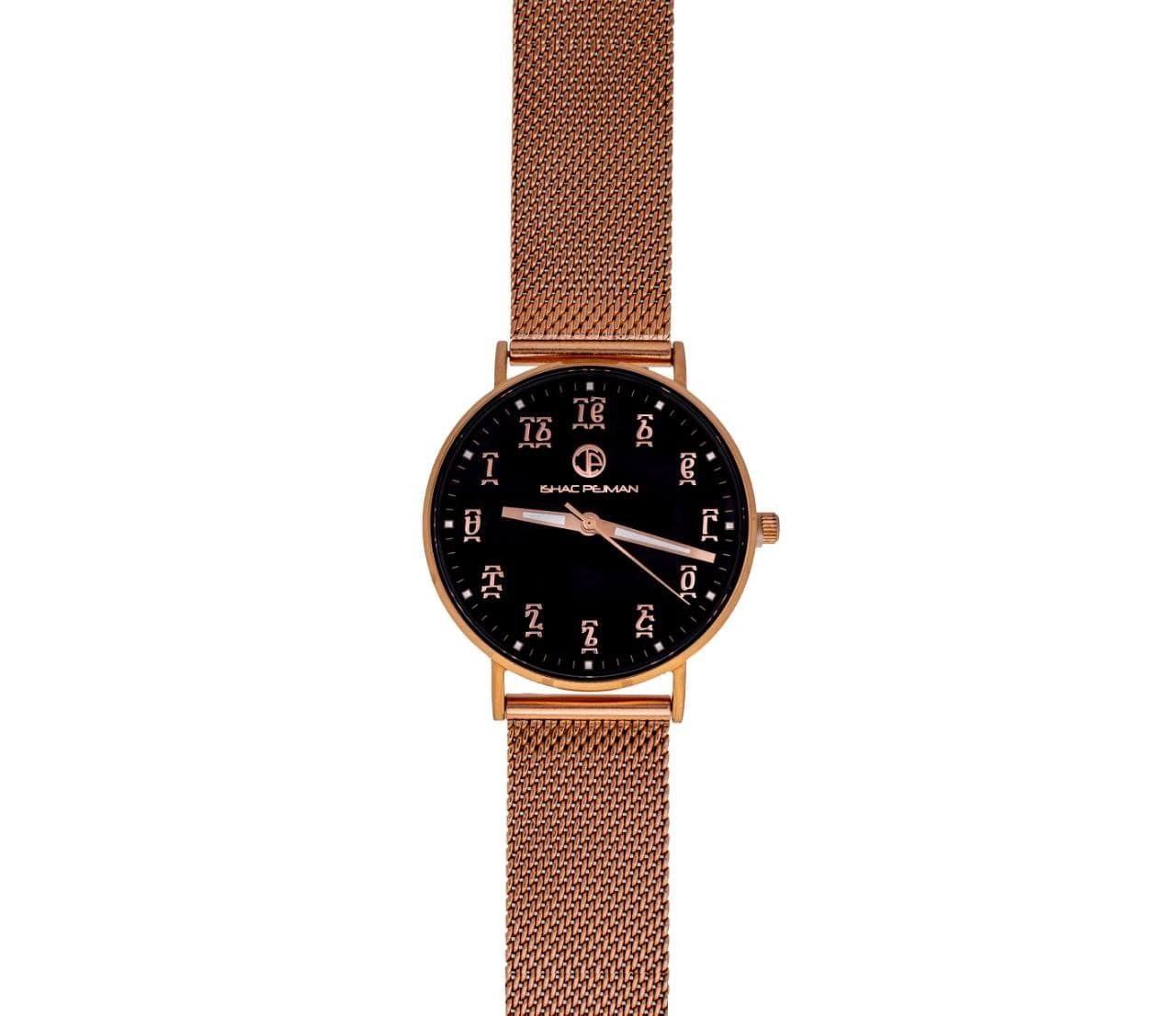 A watch with a mesh band and arabic numerals.