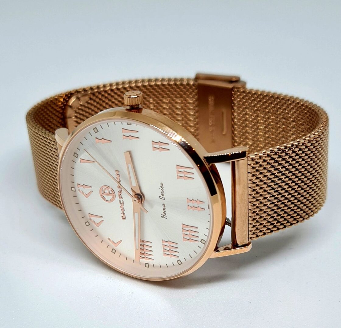 A watch is shown with the face of it.