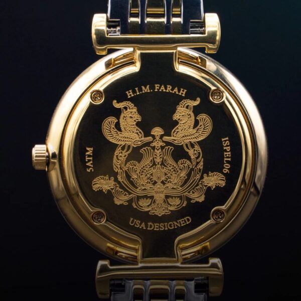 A gold watch with a black face and a golden hands.