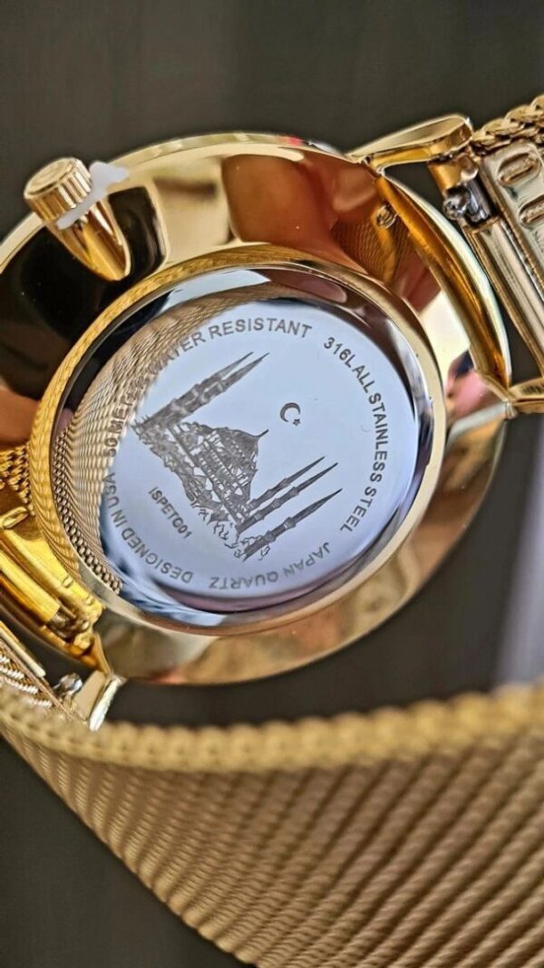A close up of the back side of a watch