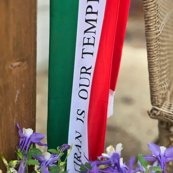 A flag with the words " pray is our temple ".