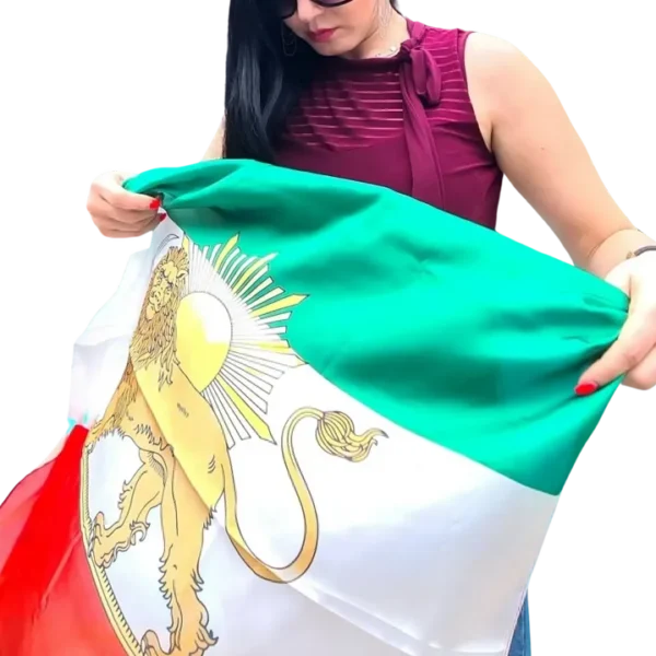 A woman holding up an italian flag with a lion on it.