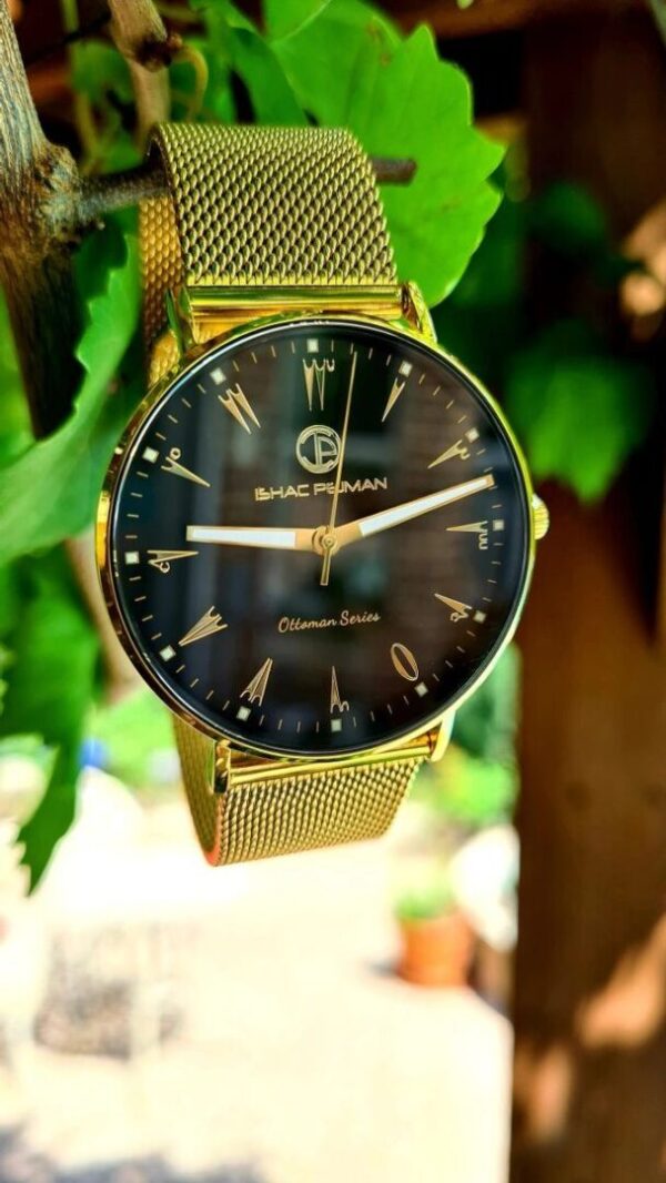 A watch is hanging on the tree